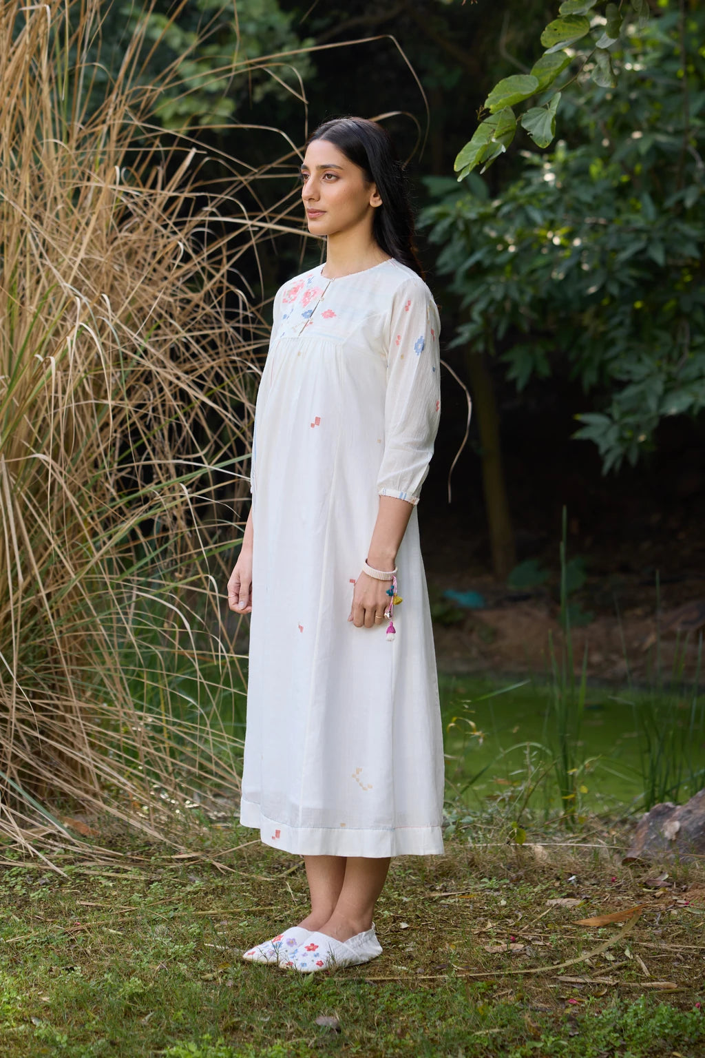 Soma Dress — White handloom cotton Jamdani dress with floral yoke — side view | Sarron
