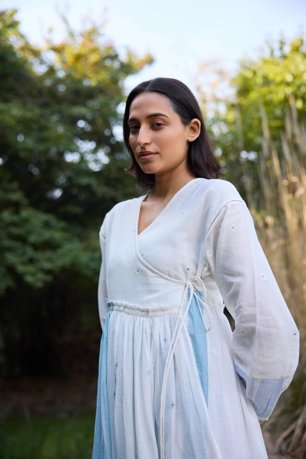 Amaya Dress — White and blue cotton Jamdani wrap dress — fabric detail | Sarron