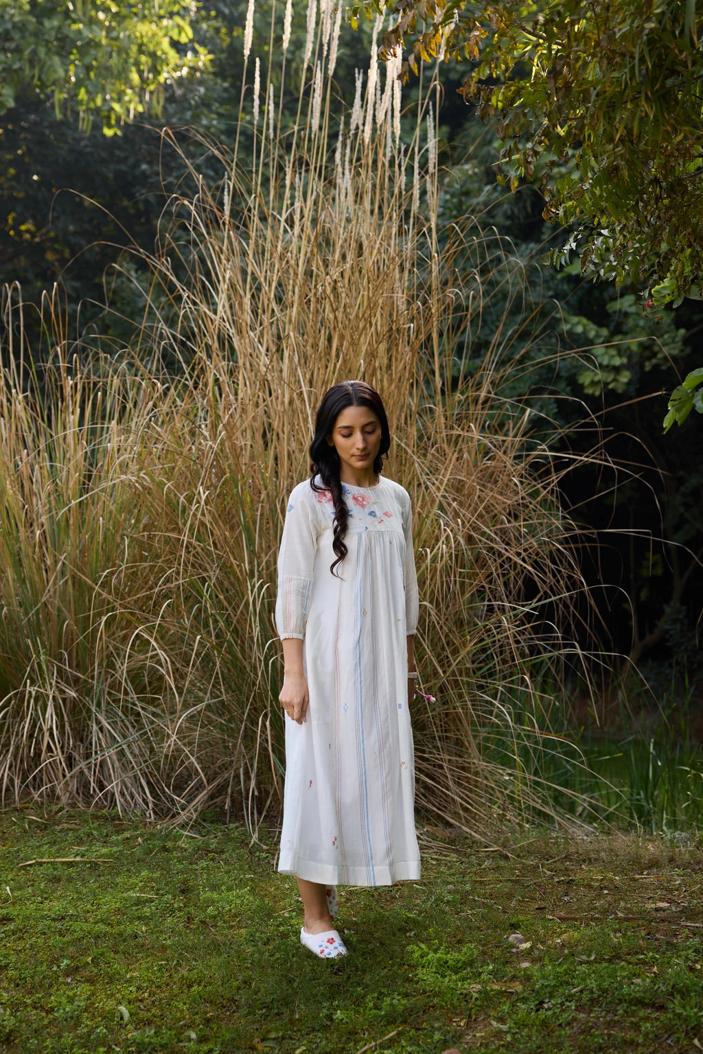 Soma Dress — White handloom cotton Jamdani dress with floral yoke — flat lay | Sarron