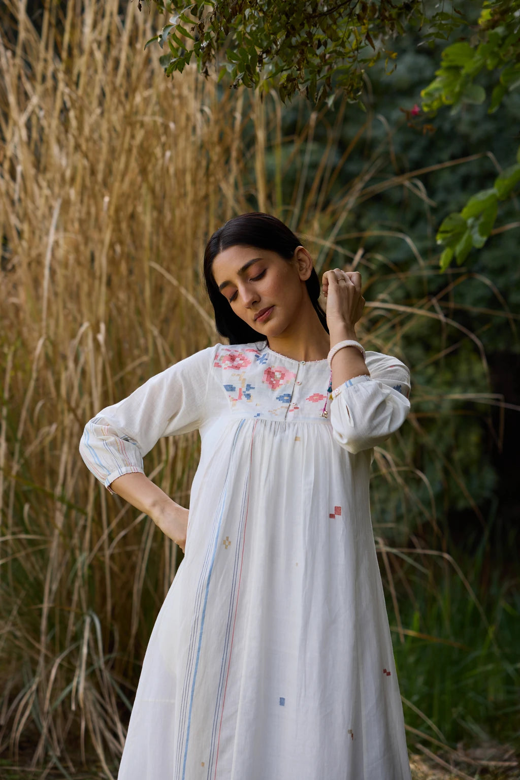 Soma Dress — White handloom cotton Jamdani dress with floral yoke — lifestyle | Sarron