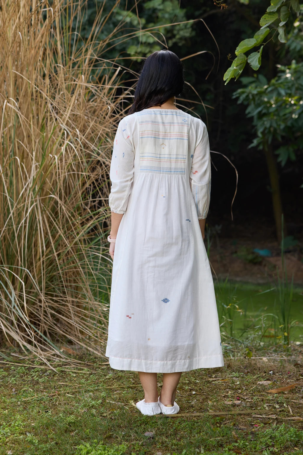 Soma Dress — White handloom cotton Jamdani dress with floral yoke — detail view | Sarron